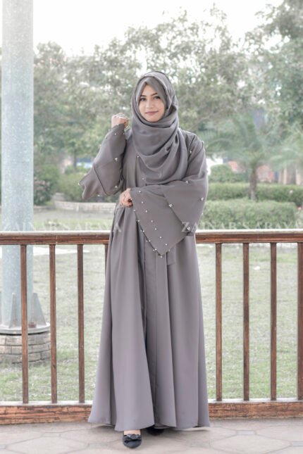 Front Open Abaya which is crafted in Nida Korean Fabric featuring the dual layer sleeves and pearl work on it as well as on scarf which is in chiffon fabric.