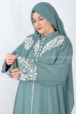 Nida Front Open Double Gown Abaya in Grape Color featuring embroidery and button style on front, sleeves and motif on the scarf as well which is in chiffon fabric.