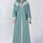 Nida Front Open Double Gown Abaya in Grape Color which is crafted in Premium Nida Korean Fabric featuring the stylish embroidery and button style on front and sleeves as well as a matching scarf in chiffon fabric with a same embroidery pattern motif .