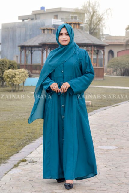 Front Open Abaya in Nida Korean Fabric featuring button down style, two side pockets, and adjustable belt or a matching scarf in chiffon fabric.