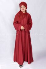 Red Colored Front Open Abaya is crafted with Premium Nida Korean Fabric with two side left right pockets as well as a matching scarf in Chiffon Fabric.