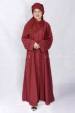 Red Colored Front Open Abaya is crafted with Premium Nida Korean Fabric with two side left right pockets as well as a matching scarf in Chiffon Fabric.