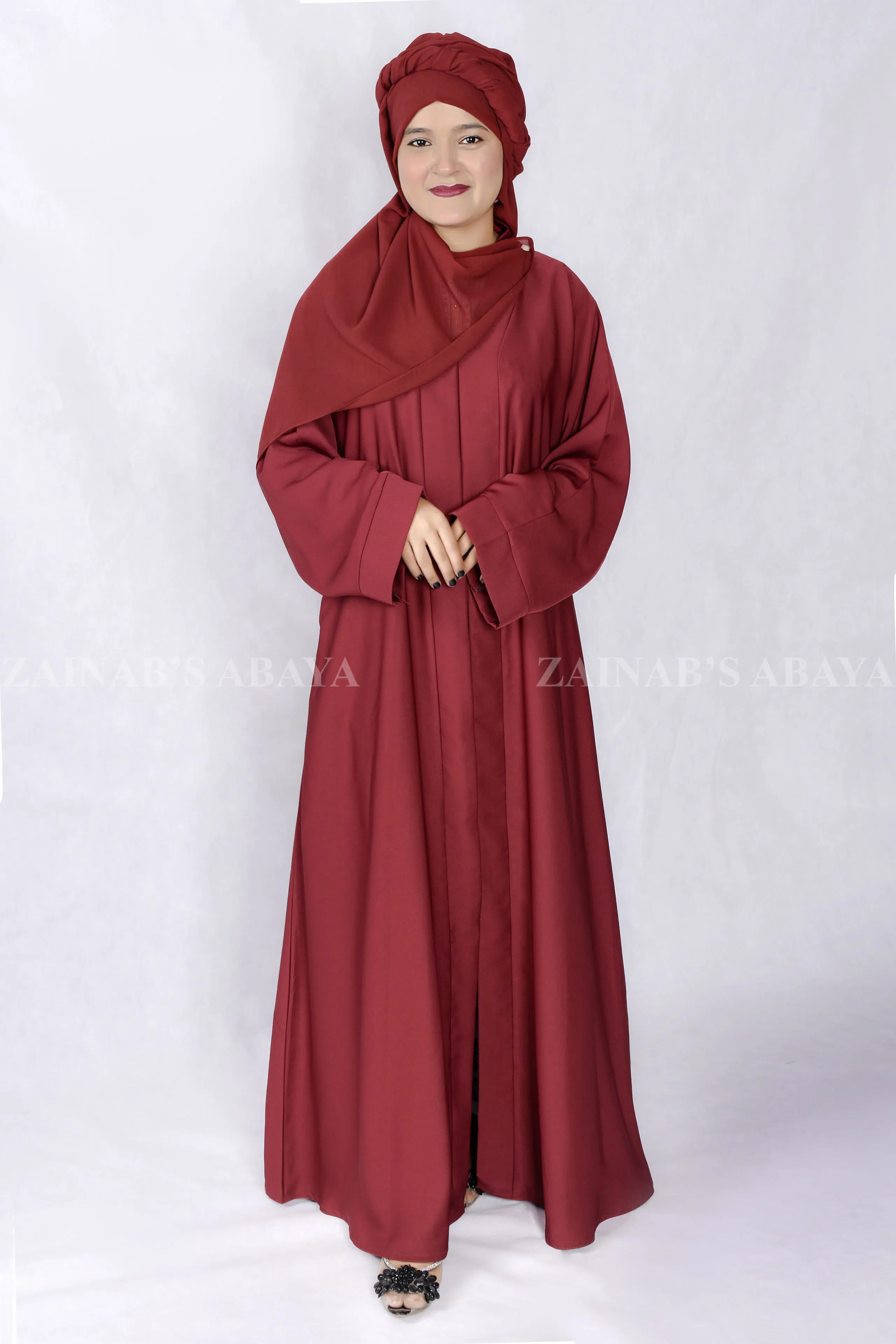 Front Open Abaya - Zainab Designer Abaya Red Colored Front Open Abaya is crafted with Premium Nida Korean Fabric with two side left right pockets as well as a matching scarf in Chiffon Fabric.