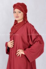 Red Colored Front Open Abaya is crafted in Premium Nida Korean Fabric with side pockets and a matching scarf in Chiffon Fabric
