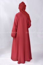 Red Colored Front Open Abaya is crafted in Premium Nida Korean Fabric with side pockets and a matching scarf in Chiffon Fabric.