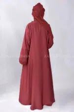 Red Colored Front Open Abaya is crafted in Premium Nida Korean Fabric with side pockets and a matching scarf in Chiffon Fabric.