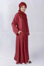 Red Colored Front Open Abaya in Nida Korean Fabric with left right side pockets as well as a matching scarf in Chiffon Fabric.