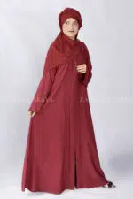 Red Colored Front Open Abaya is crafted with Imported Nida Korean Fabric with side pockets and a matching scarf in Chiffon Fabric.