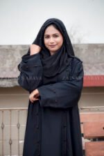 Black Maxi Abaya in Nida Korean Fabric featuring the strips and pearl work on front and sleeves as well as on scarf which is in chiffon fabric.