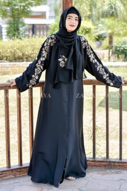 Black Front Open Abaya in Nida Korean Fabric with Embroideyr on Sleeves, Back and Motif on the scarf in same embroidery pattern which is in chiffon fabric.