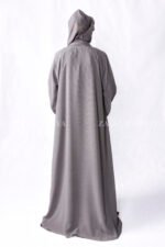 Grey Colored Gown Abaya in Nida Korean Fabric featuring embroidery and cutwork on front borders and sleeves as well as same matching scarf in chiffon.
