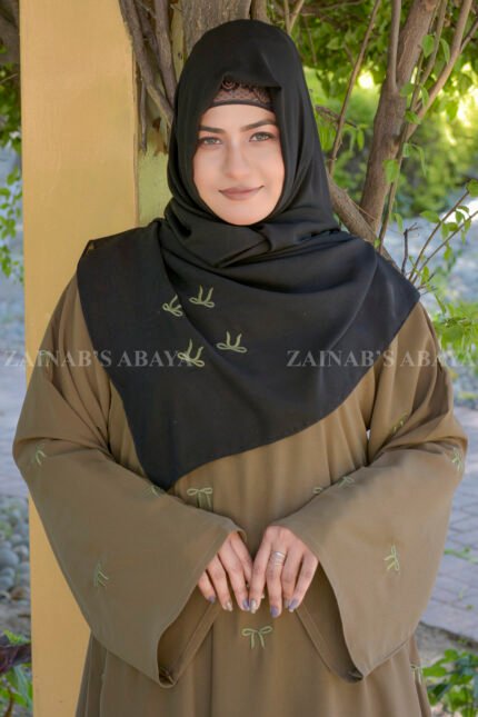 Nida Maxi Abaya for women in Skin Color with Stylish Bow Embroidery