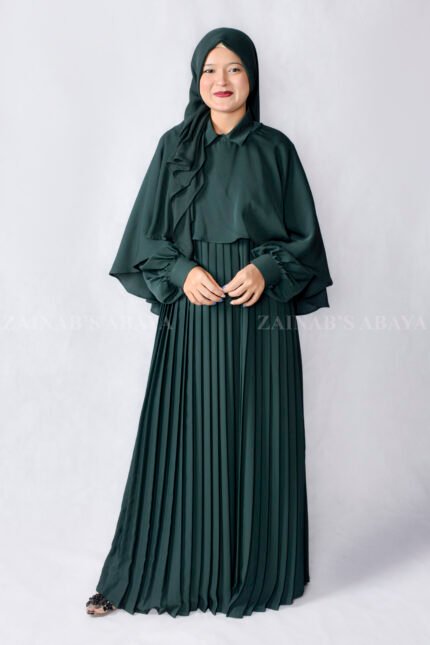 Nida Maxi Abaya with Shrug features elegant plates style at front, cuff style sleeves and a matching scarf in chiffon fabric.
