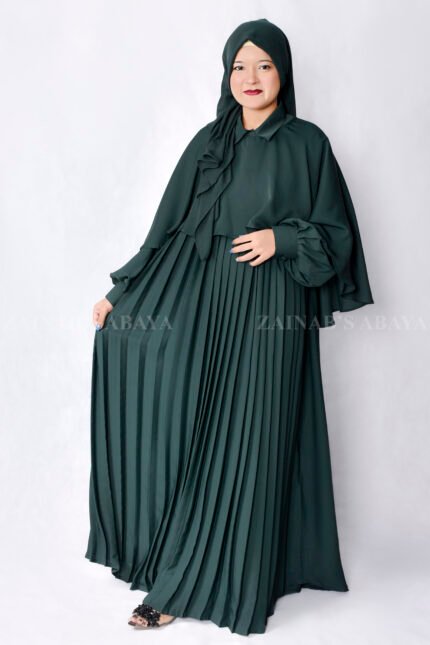 Nida Maxi Abaya with Shrug features elegant plates style , cuff style sleeves and a matching scarf in chiffon fabric.