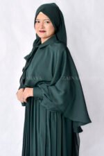 Nida Maxi Abaya with Shrug features the elegant plates style at front, cuff style sleeves and matching scarf in chiffon fabric.