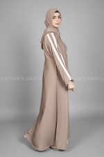 This Stylish Hoodie Abaya for women in Pakistan is crafted with Premium Nida Korean Fabric and a matching scarf in chiffon fabric.