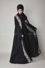 Nida Front Open Abaya for women in Black Color with embroidery on front and a matching scarf in chiffon fabric.