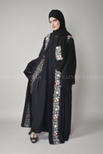 Nida Front Open Abaya for women in Black Color with Embroidery on Front borders and a matching scarf in chiffon fabric.