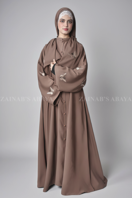Nida Colored Front Open Abaya with Butterfly Embroidery on Sleeves and Button Style on Front as well as a matching scarf in chiffon fabric.