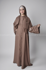 Nida Colored Front Open Abaya for women with Butterfly Style Embroidery on Sleeves and button style on front as well as matching scarf in chiffon fabric.