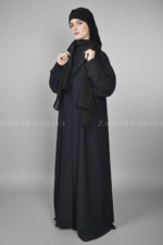 Black Coat Style Abaya for women in Nida Korean Fabric as well as matching scarf in chiffon fabric.