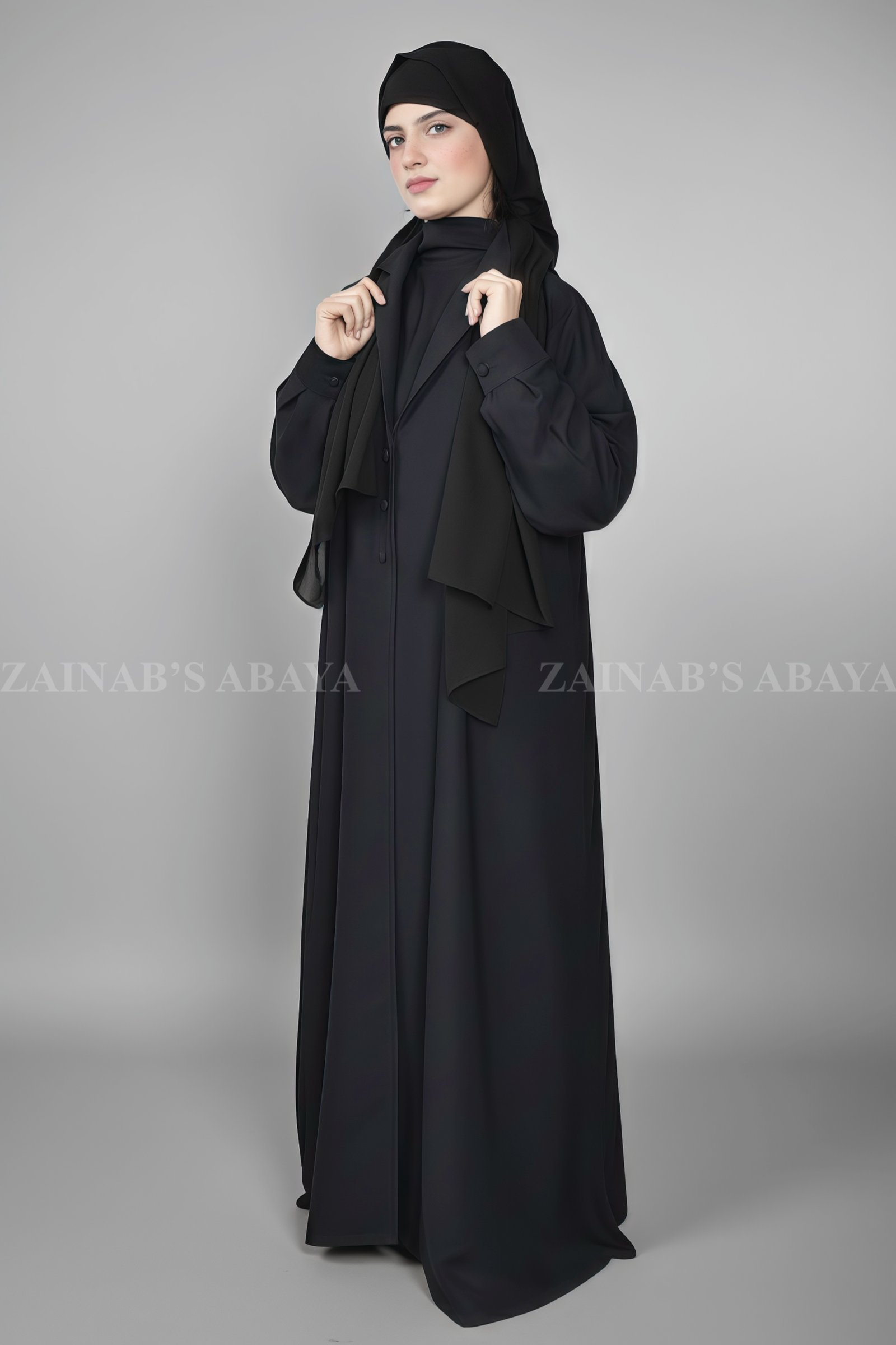 Coat Style Abaya - Zainab Designer Abaya Black Coat Style Abaya for women in Nida Korean Fabric as well as matching scarf in chiffon fabric.
