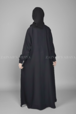 Black Coat Style Abaya for women in Nida Korean Fabric with a matching scarf in chiffon fabric.