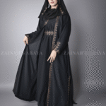 Black Maxi Abaya for Women in Nida With Embroidered Chiffon Top an embroidered belt and a matching scarf in chiffon fabric.
