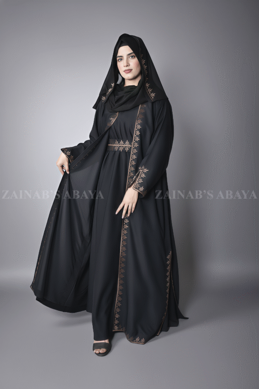 Black Maxi Abaya for Women in Nida With Embroidered Chiffon Top an embroidered belt and a matching scarf in chiffon fabric.