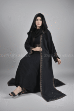 Black Maxi Abaya for women in Nida Fabric with Embroidered Top Chiffon an embroidered belt or a matching scarf in chiffon fabric.