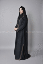 Black Maxi Abaya for women in Nida Korean Fabric with An Embroidered Top in Chiffon Fabric.