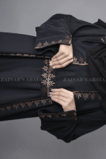 Black Maxi Abaya for women in Nida Korean Fabric with An Embroidered Top in Chiffon Fabric.