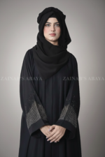 Black Front Open Abaya for women in Pakistan is crafted with Premium Nida Korean Fabric and stone embellishment on sleeves.