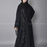 Black Colored Front Open Abaya for women with Embroider and Stone Work on Left Side at front as well as matching scarf in chiffon fabric.