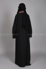 Nida Coat Style Abaya for women in Black Color with Kasni Colored attached inner and a matching scarf in chiffon fabric