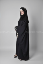 Black Kaftan Abaya for women is crafted with Premium Nida Korean Fabric featuring embroidery and matching scarf in chiffon fabric.