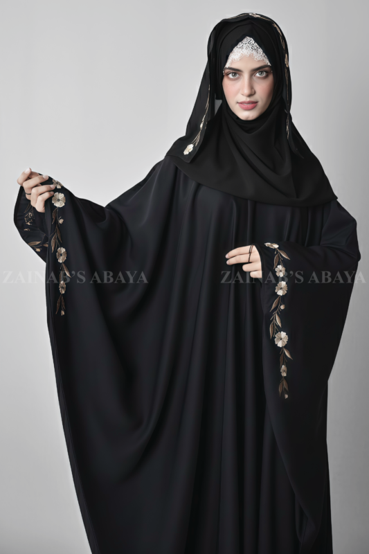 Black Kaftan Abaya for women is crafted with Premium Nida Korean Fabric featuring the embroidery and matching scarf in chiffon fabric.