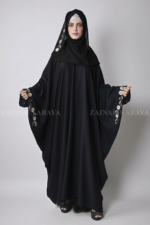 Black Kaftan Abaya for women is crafted with Premium Nida Korean Fabric featuring the embroidery on sleeves and matching scarf in chiffon fabric.