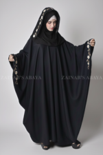 Black Kaftan Abaya for women in crafted with Premium Nida Korean Fabric featuring the embroidery and matching scarf in chiffon fabric.