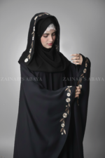 Black Kaftan Abaya for Women is crafted with Premium Nida Korean Fabric featuring the embroidery and matching scarf in chiffon fabric.