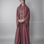 T.Pink Colored Double Front Open Gown Abaya for Women in Nida Korean Fabric with embroidery and pearl work on front and sleeves as well as a matching scarf in chiffon fabric.