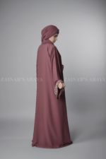 T.Pink Colored Double Front Open Gown Abaya for Women in Nida Korean Fabric with embroidery and pearl work on front and sleeves as well as a matching scarf in chiffon fabric.