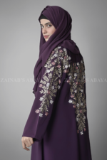 Embroidered Maxi Abaya for women in Pakistan in Purple Color crafted with Premium Nida Korean Fabric as well as matching scarf in chiffon fabric.