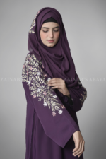 Embroidered Maxi Abaya for women in Purple Color which is crafted with Premium Nida Korean Fabric as well as matching scarf in chiffon fabric.