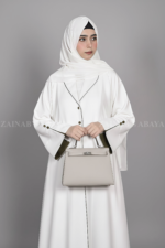 Nida Coat Style Abaya for Women in Pakistan which is crafted with premium Nida Korean Fabric