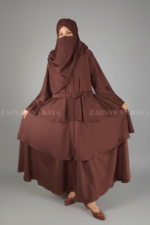 Nida Umbrella Abaya for women in Pakistan with open style from front and scarf in chiffon fabric.