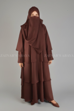 Nida Umbrella Abaya for women in Pakistan with open style from front and matching scarf in chiffon fabric.