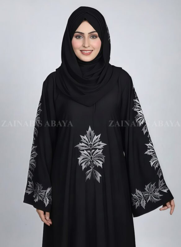 Black Embroidered Umbrella Abaya for women in Pakistan which is crafted with premium Nida Korean Fabric at cheap price as well as a matching scarf in chiffon fabric.