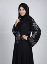 Black Embroidered Umbrella Abaya for women in Pakistan which is crafted with Premium Nida Korean Fabric at cheap price as well as a matching scarf in chiffon fabric.