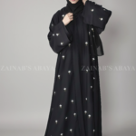 Nida Double Gown Abaya for Women in Black Color with Embroidery as well as a matching scarf in chiffon fabric.